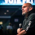 Carville Torches Dems — Power Gone Bald man in a hoodie speaking into a microphone on stage