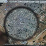Trump’s Board of Peace Unveils HUGE Gaza Plan Magnifying glass highlighting Gaza on a digital map