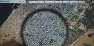 Trump’s Board of Peace Unveils HUGE Gaza Plan Magnifying glass highlighting Gaza on a digital map