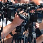 AI’s Dirty Engine: Gas Takes Over television cameras on tripods at a media event