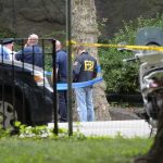 Fireball Outside FBI HQ Sparks Panic law enforcement officers gather at taped-off outdoor scene