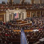 NJ Lt. Governor Under Investigation Legislative chamber filled with attendees during a formal address