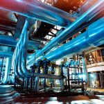 69 Gas Turbines Are Cooking the Air in THIS State Industrial plant with large metal pipes and gauges