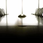White House AI Deal Meets an Unexpected Federal Test empty conference room with long table and chairs