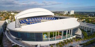 Baseball stadium with retractable roof partially open