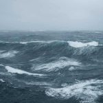Outrage Over 60-Day Nuclear Freebie Rough ocean waves under a cloudy sky