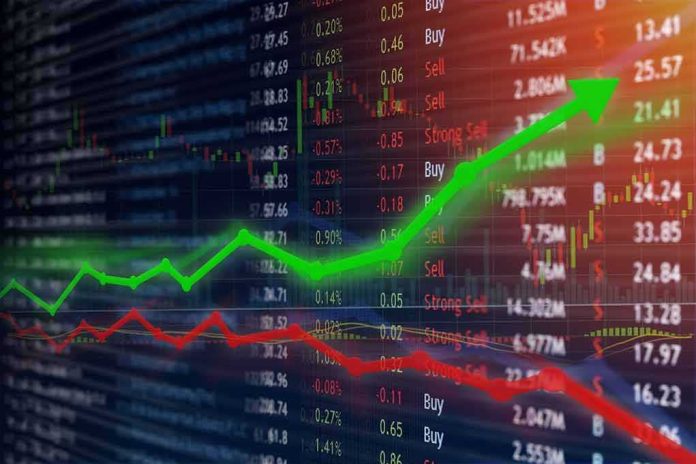shutterstock_750493204 Stock market chart with green upward arrow and red downward line