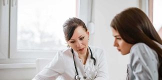 Your EYES Could Reveal a Hidden Heart Problem Doctor consulting a patient at a desk
