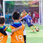 6-Year-Old KILLED as Truck Plows Soccer Field Two boys watching a soccer game together.