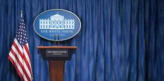 Trump’s WILD Plan for the Press Room White House press briefing podium with U.S. flag and blue curtain