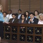 Attorney pointing toward the jury in a courtroom