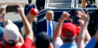Secret Service Tries to CANCEL Trump Rally Man in suit greeted by crowd with raised hands