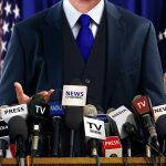 Trump Warns News Outlets They’d Be FINISHED A speaker at a press conference with multiple microphones in front of them