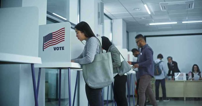 Voters at polling booths in a modern voting center